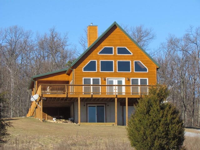 Cedar Siding Custom Home side with deck
