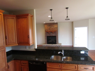 Primrose Custom Home kitchen and fire place