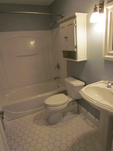 Complete Professionally Designed Renovation all white bathroom