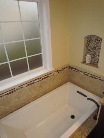 Master Bathroom En Suite bathtub with window